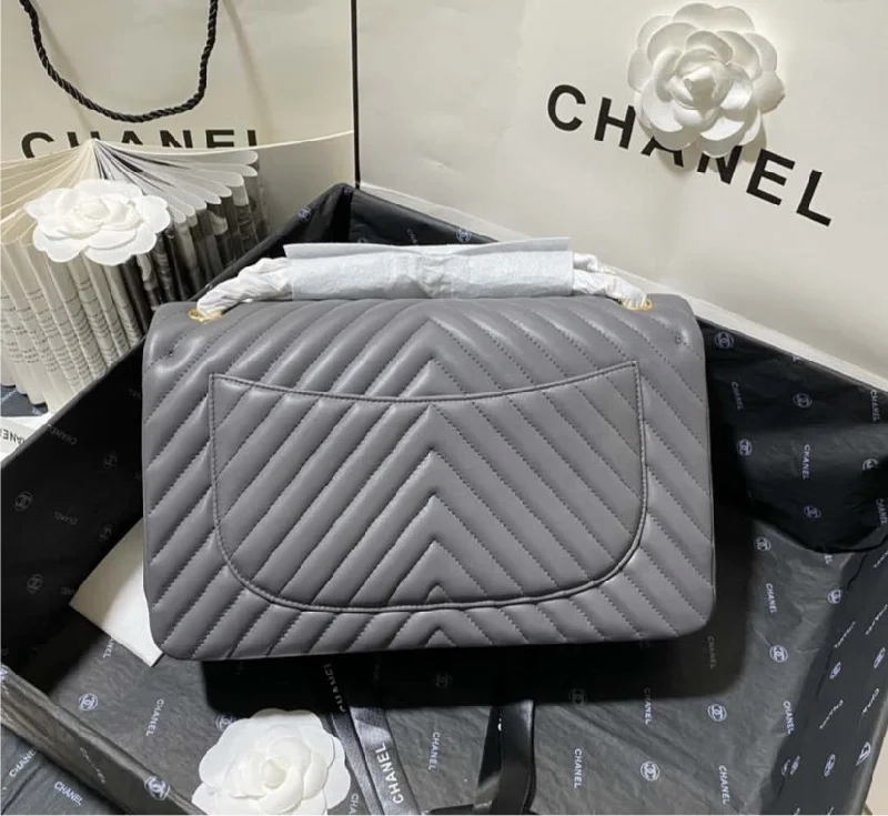 Grey Chanel woman handbag